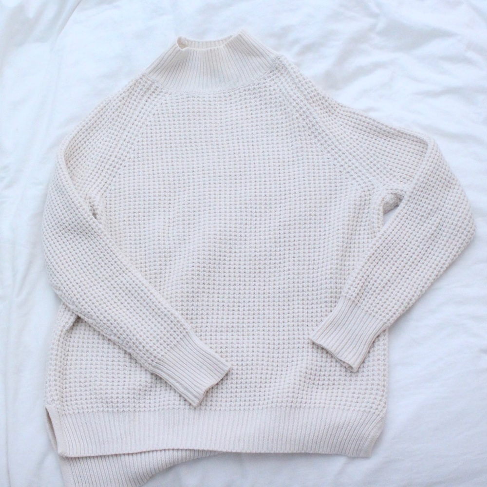 White/cream knitted turtleneck sweater